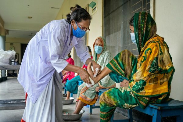 Every day, before the doctors start morning ward rounds, patients soak their feet in warm water as part of their self-care routine.

DBLM Hospital is a specialist leprosy treatment and general medical services for people affected by leprosy and the local community. It is the only reconstructive surgery referral centre in Bangladesh.